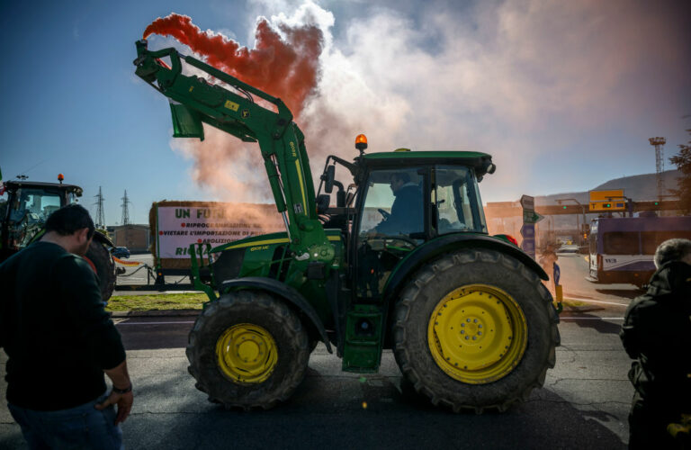 ORTE, ITALY - FEBRUARY 3: Farmers with their tractors gather near the A1 highway to protest against EU agriculture policies, on February 3, 2024 in Orte, Italy. Farmers and agricultural workers are holding protests across Europe and various part of Italy to protest against EU agriculture policies.